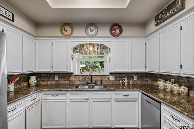 113 Granada Sq, Canton, TX 75103 - kitchen featuring dishwasher, a sink, white cabinets, and dark stone countertops