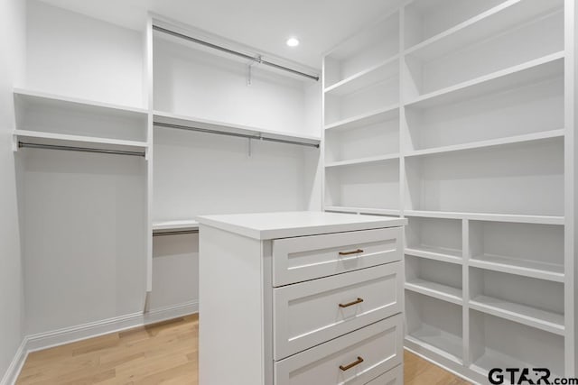 walk in closet featuring light wood-type flooring