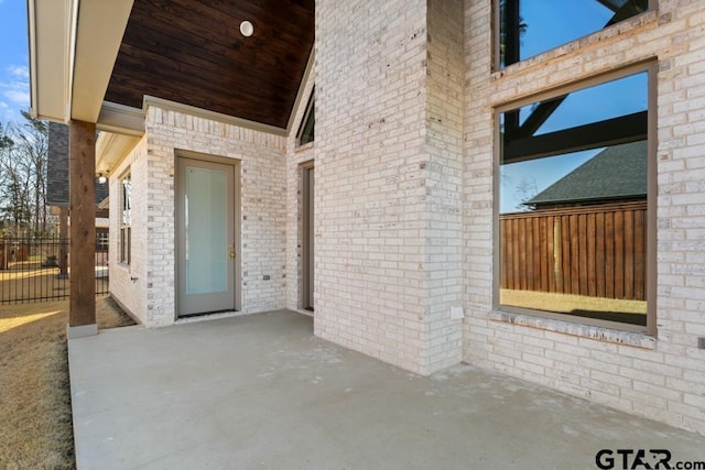 view of patio with fence