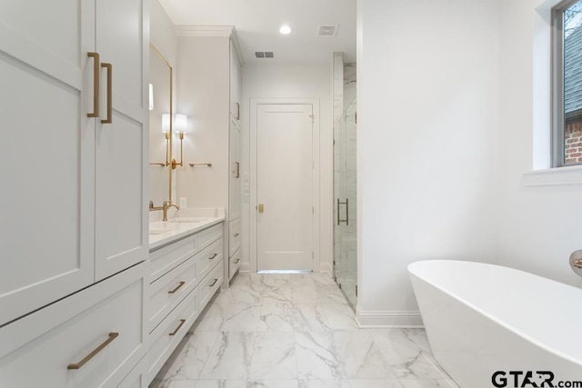 full bathroom with vanity, visible vents, a freestanding tub, a stall shower, and marble finish floor