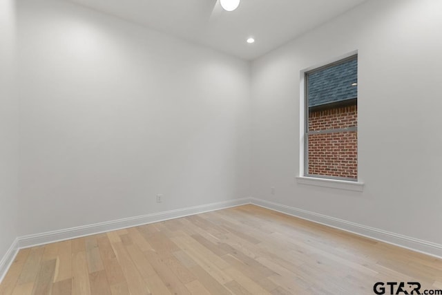 empty room featuring recessed lighting, baseboards, light wood-style floors, and a ceiling fan