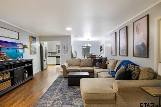 315 Ridgecrest Dr, Tyler, TX 75701 - living area featuring a chandelier, crown molding, and dark wood-style flooring