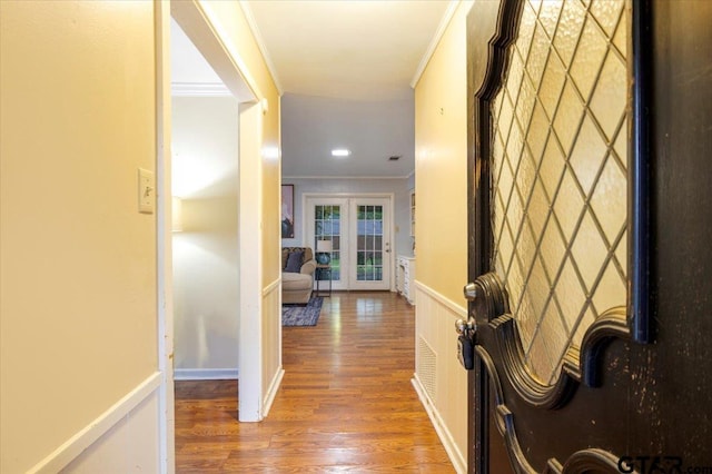 315 Ridgecrest Dr, Tyler, TX 75701 - corridor featuring crown molding, wood finished floors, french doors, and wainscoting