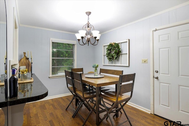 315 Ridgecrest Dr, Tyler, TX 75701 - dining room featuring a chandelier, dark wood-style floors, and crown molding