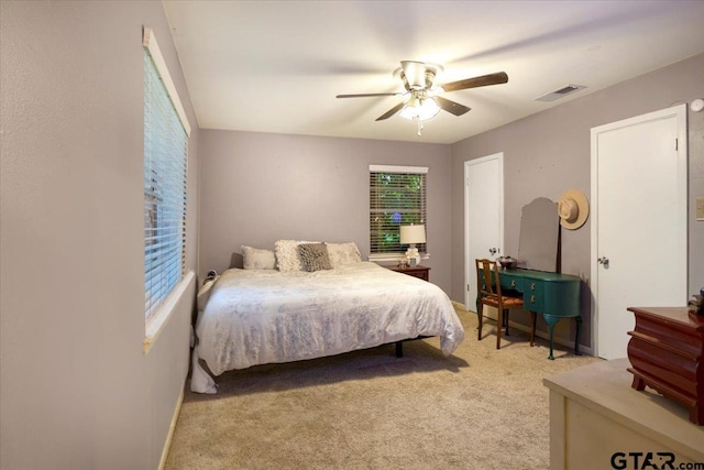 315 Ridgecrest Dr, Tyler, TX 75701 - bedroom with light carpet and ceiling fan