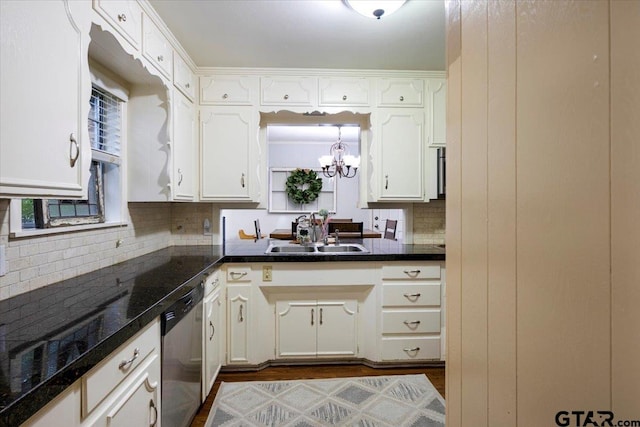 315 Ridgecrest Dr, Tyler, TX 75701 - kitchen with stainless steel dishwasher, a chandelier, white cabinetry, decorative backsplash, and dark wood-style floors