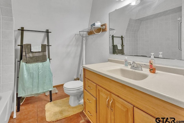 full bathroom with tile patterned flooring, vanity, bathtub / shower combination, and toilet