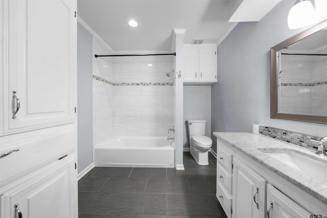 full bathroom featuring vanity, tasteful backsplash, ornamental molding, tiled shower / bath, and toilet