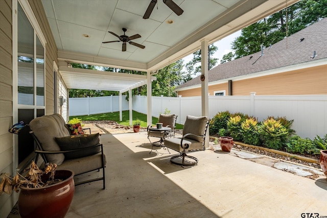 3953 Hanover Pl, Tyler, TX 75701 - fenced backyard with a patio area and a ceiling fan