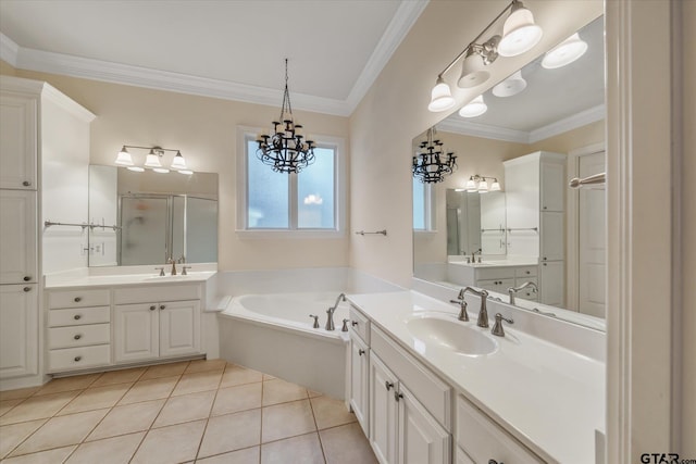 3953 Hanover Pl, Tyler, TX 75701 - bathroom featuring a bath, two vanities, a stall shower, crown molding, and tile patterned flooring