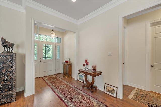 3953 Hanover Pl, Tyler, TX 75701 - foyer featuring wood finished floors and ornamental molding