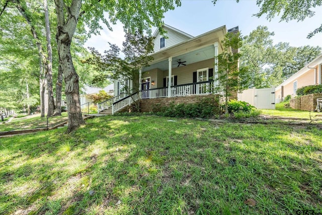 3953 Hanover Pl, Tyler, TX 75701 - view of front of home featuring a ceiling fan, a gate, covered porch, and stairway