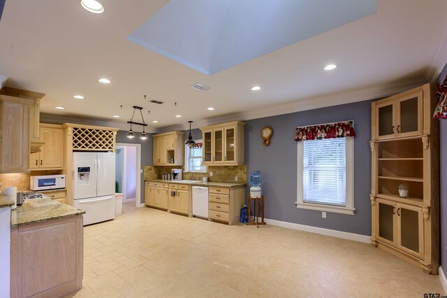 kitchen featuring hanging light fixtures, tasteful backsplash, ornamental molding, light stone countertops, and white appliances