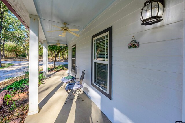 view of patio featuring a porch and ceiling fan