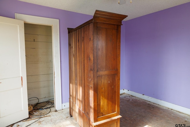 interior space with a textured ceiling