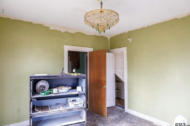 interior space featuring a chandelier