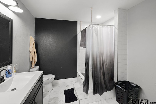 260 County Road 2302, Rusk, TX 75785 - full bathroom featuring marble finish flooring, vanity, tiled shower, toilet, and baseboards