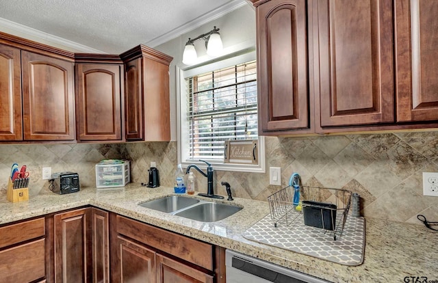 260 County Road 2302, Rusk, TX 75785 - kitchen featuring a sink, crown molding, dishwasher, backsplash, and light stone counters
