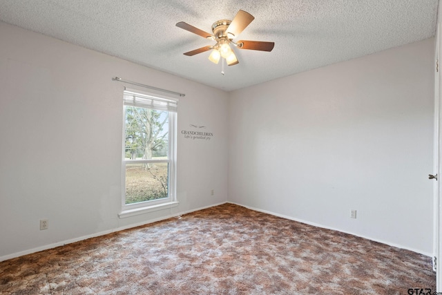 empty room featuring carpet, ceiling fan, and a textured ceiling