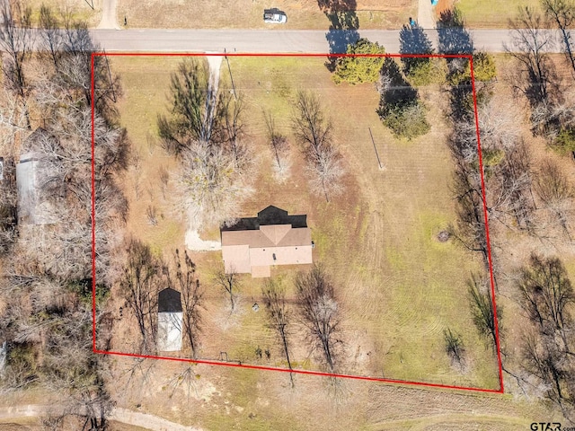 birds eye view of property featuring a rural view