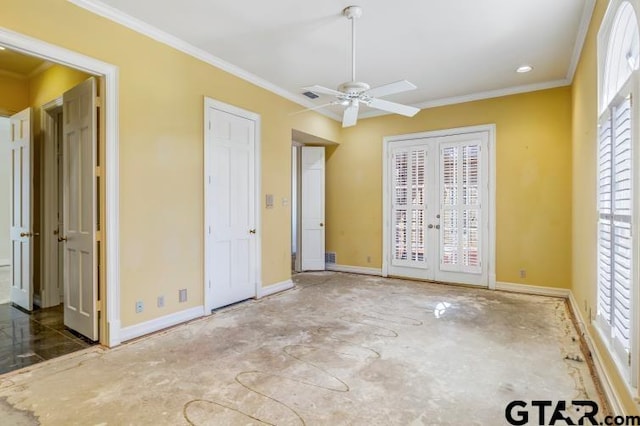 empty room with ornamental molding, french doors, visible vents, and baseboards