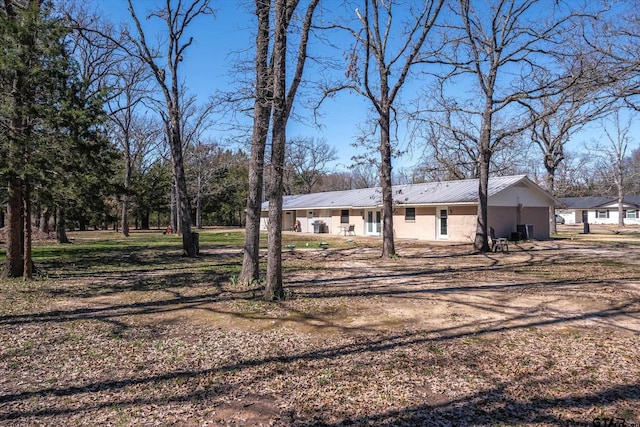 110 Vz County Road 2121, Canton, TX 75103 - exterior space with metal roof and stucco siding