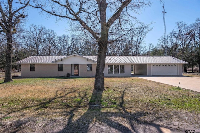 110 Vz County Road 2121, Canton, TX 75103 - ranch-style house featuring metal roof, driveway, a front lawn, and an attached garage