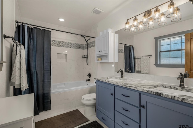 110 Vz County Road 2121, Canton, TX 75103 - full bath featuring double vanity, tiled shower / bath combo, a sink, and visible vents