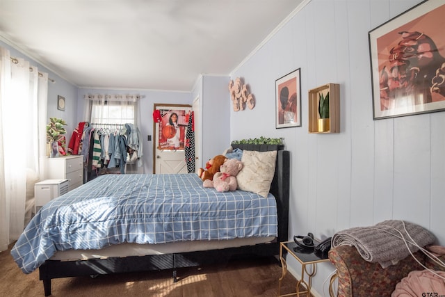 bedroom with ornamental molding