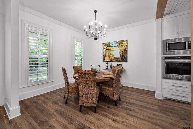 dining space with baseboards, a chandelier, and dark wood-type flooring
