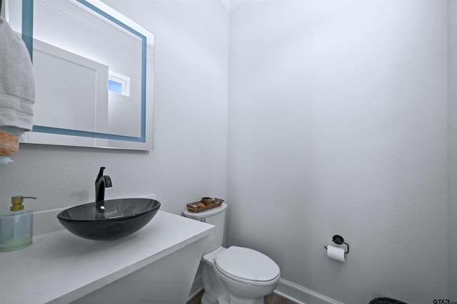 bathroom with sink and toilet