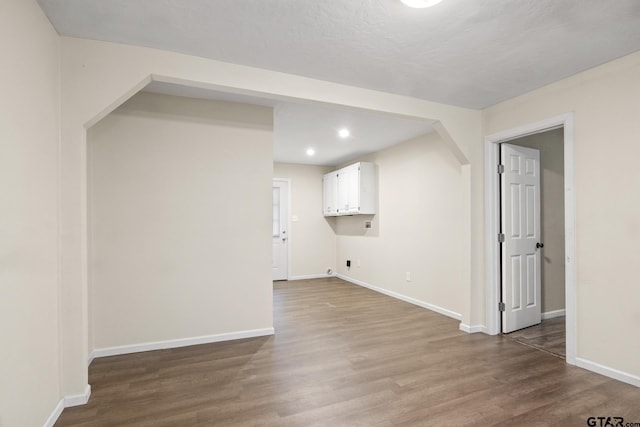 interior space with hardwood / wood-style flooring