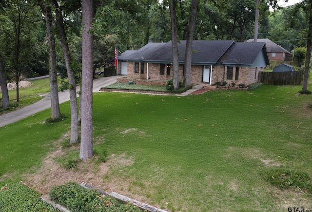 17617 Carol Cir, Flint, TX 75762 - single story home featuring driveway, a garage, and brick siding
