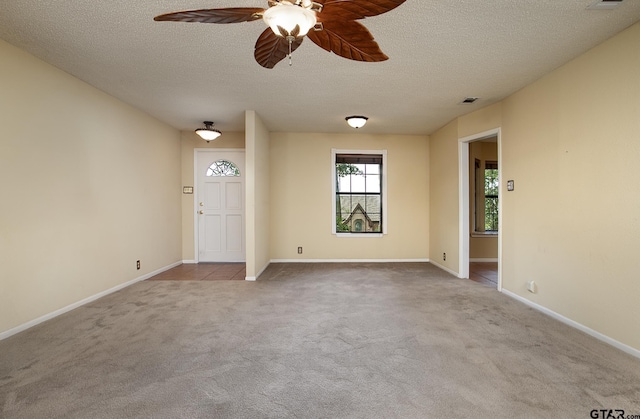 17617 Carol Cir, Flint, TX 75762 - empty room featuring carpet flooring, ceiling fan, a textured ceiling, and baseboards