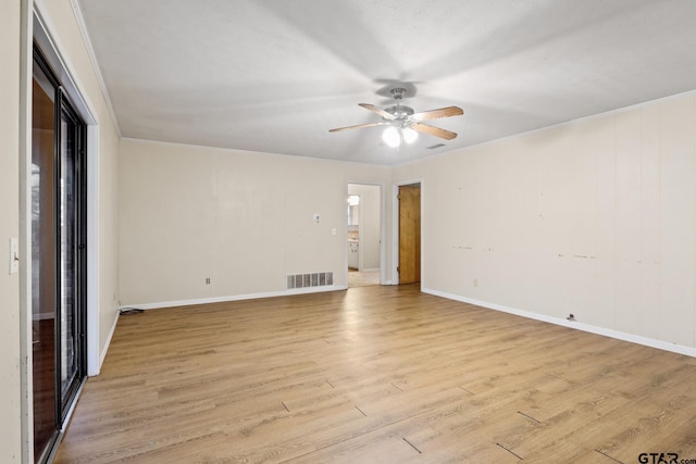 unfurnished room with crown molding, ceiling fan, and light hardwood / wood-style flooring