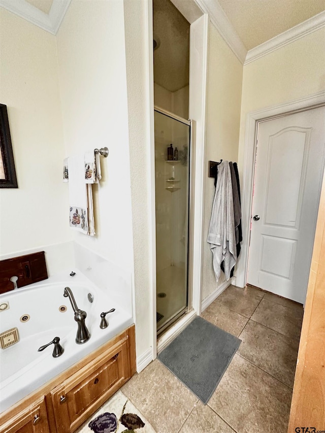 bathroom with tile patterned floors, separate shower and tub, ornamental molding, and a textured ceiling