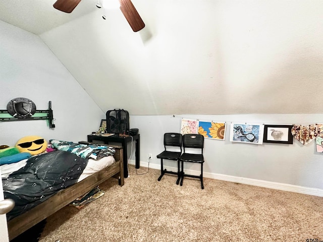 bedroom featuring carpet floors, vaulted ceiling, and ceiling fan