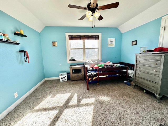 bedroom with carpet flooring, ceiling fan, and lofted ceiling