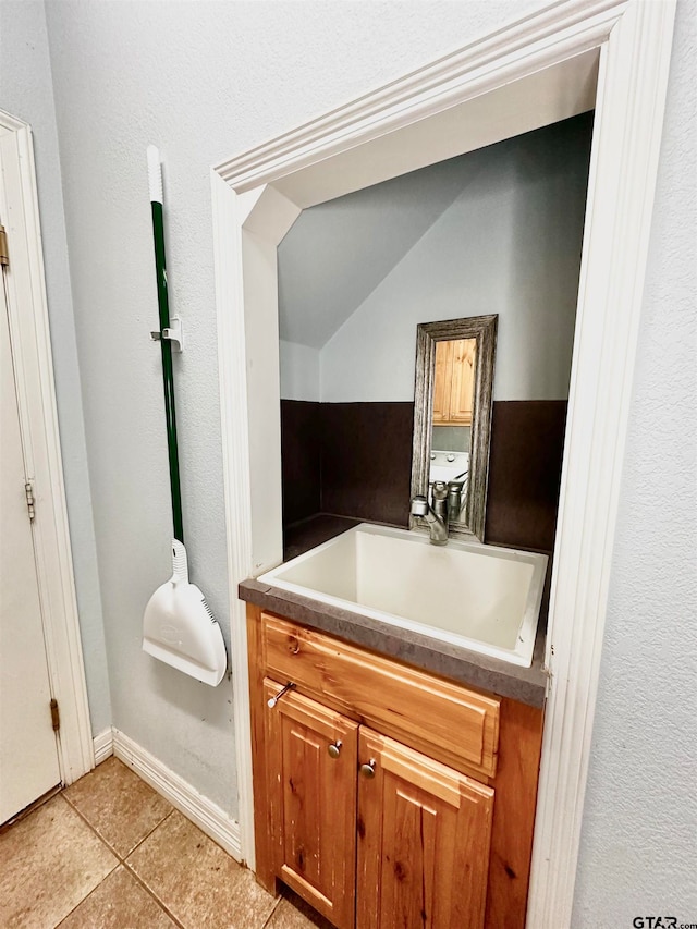 bathroom with vanity and tile patterned floors