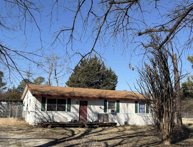 view of front of property with cooling unit