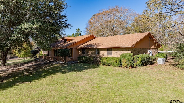 exterior space with a front lawn