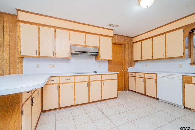 kitchen featuring dishwasher, light tile patterned flooring, and stovetop