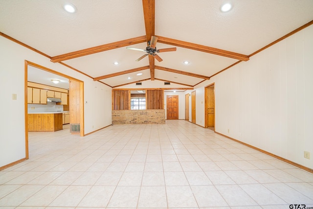 unfurnished living room featuring light tile patterned floors, vaulted ceiling with beams, ceiling fan, and ornamental molding