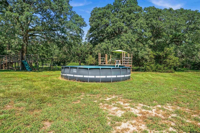 view of yard with a playground