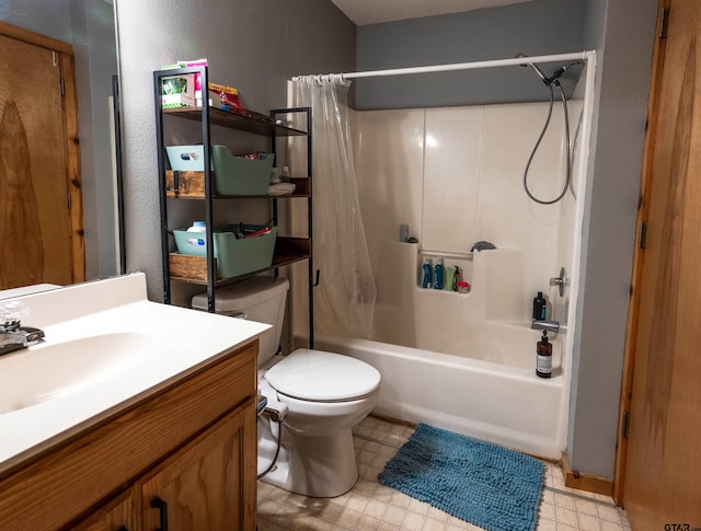 bathroom with shower / bath combo, vanity, toilet, and tile patterned floors