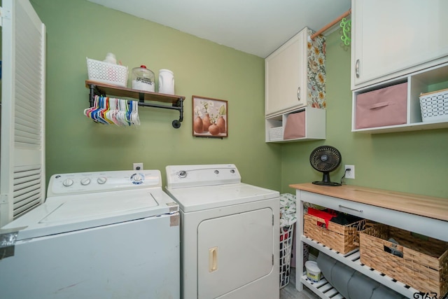141 Cedar St, Rusk, TX 75785 - laundry area featuring cabinet space and washing machine and clothes dryer