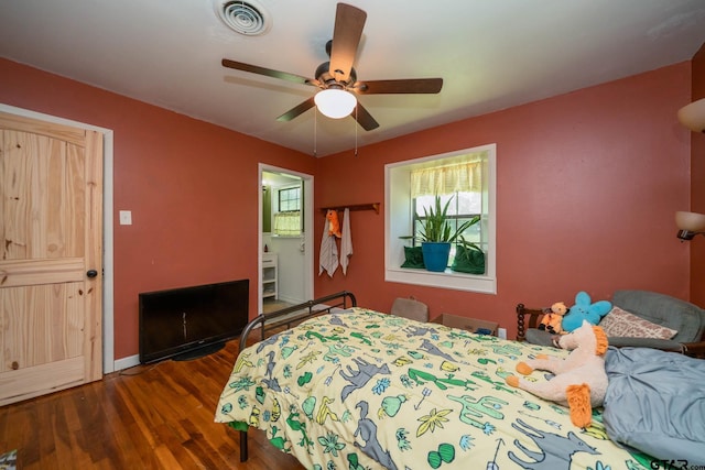 141 Cedar St, Rusk, TX 75785 - bedroom with wood finished floors, a ceiling fan, and baseboards