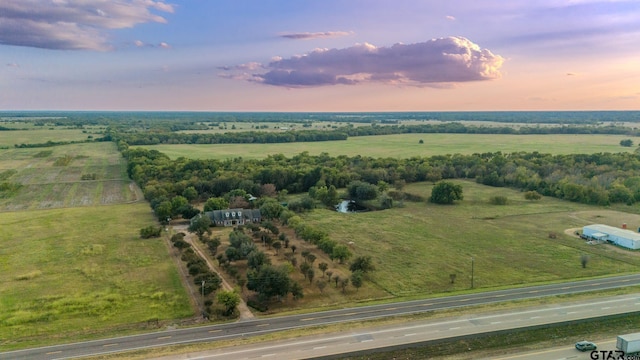 aerial view at dusk with a rural view