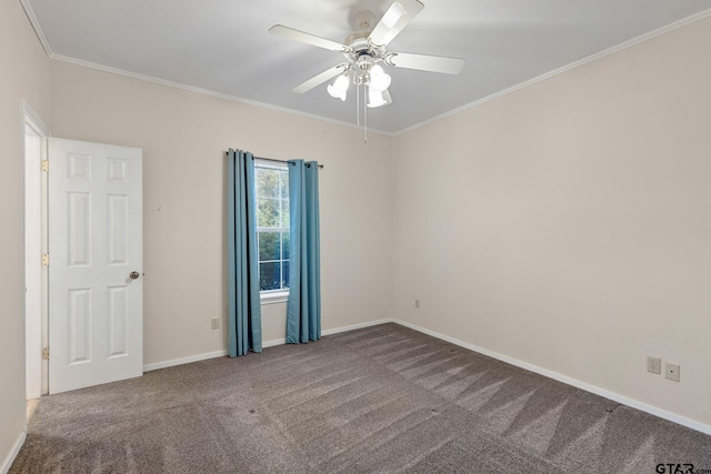 unfurnished room with ornamental molding, ceiling fan, and carpet floors