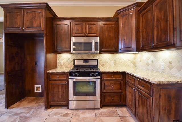 kitchen with dishwasher, sink, hanging light fixtures, kitchen peninsula, and decorative backsplash